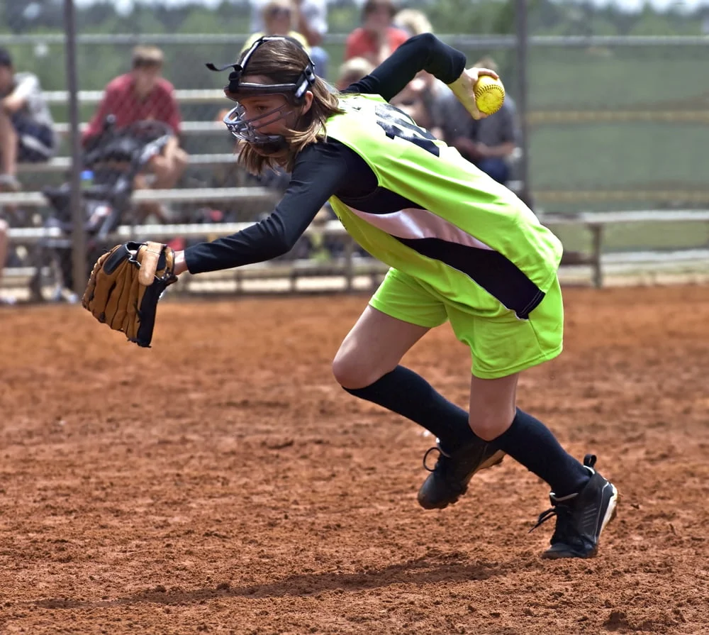 Baseball And Softball Team Names That Hit It Out Of The Park, softball player fielding
